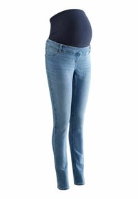 Jeans skinny de maternitate din denim ușor albastru, cu un talie elastică de culoare bleumarin închis, având un design ajustat și buzunare standard.