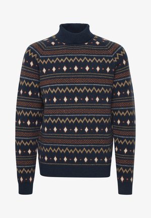 Kootud tumesinine sviiter kõrge kaelusega. Omab geomeetrilisi mustreid valge, oranži ja pruuni värviga üle keha ja varrukate. Soe tekstuur.