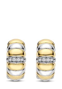 Gold- und Silber-Ohrringe mit glatten, geschwungenen Schichten, die in der Mitte eine Reihe von fünf kleinen Diamanten haben.