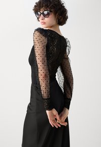 Morgan TORMI - Bluse - noir