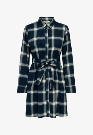 Ciemna sukienka koszulowa w kratę w kolorze granatowym, zielonym i białym z długimi rękawami, z przodem zapinanym na guziki i paskiem do związywania w talii. Wykonana z tkanej tkaniny.