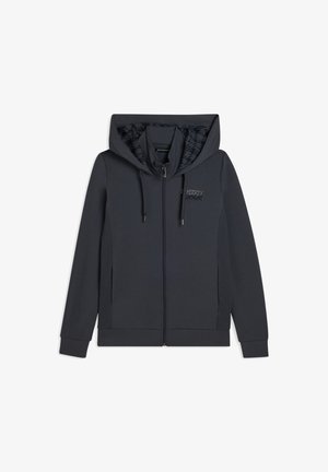 Cazadora con cremallera de color gris oscuro, con un forro interior estampado, capucha con cordón y un logo sutil en el pecho. Tejido de mezcla de algodón.