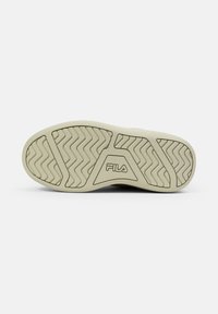 Suola in gomma beige con un motivo di battistrada ondulato. Presenta un logo "FILA" prominente all'interno di una forma a diamante al centro.