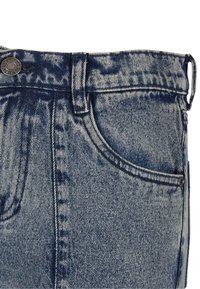 Light blue denim jeans with a faded wash, featuring a button closure, belt loops, and a front pocket. Textured fabric with visible stitching.