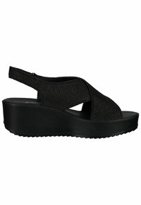 Black wedge sandals with a textured upper featuring a cross strap design and a slingback style. Thick rubber sole with ridged texture.