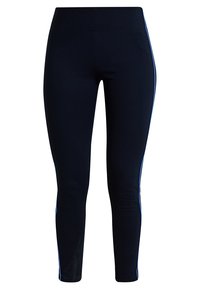 Marineblauwe leggings van rekbaar materiaal, met een gladde textuur en contrasterende lichtblauwe zijkanten. Middelhoge taille met een aansluitende pasvorm.