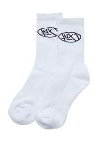 Weiße Baumwollsocken mit einem schwarzen Logodesign. Die Socken haben einen gerippten Bund und eine verstärkte Zehenpartie. Klassischer sportlicher Stil.