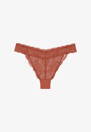 Lace thong in terracotta with floral pattern and scalloped edges, featuring a smooth waistband and sheer texture throughout.