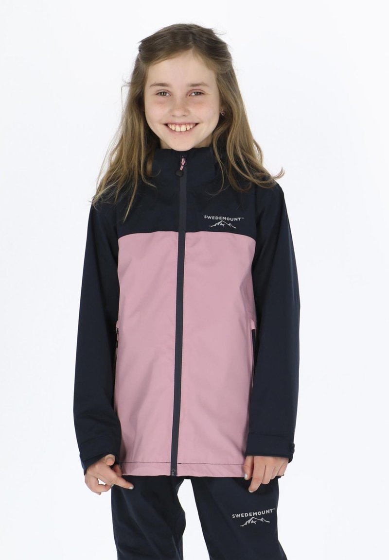 Jacket made of waterproof fabric, featuring a navy blue upper and pink lower section, with a zip closure and logo on the chest.
