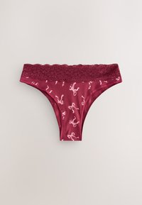 Burgundy women's underwear with pink bow patterns and wide floral lace waistband, displayed on a light neutral background.