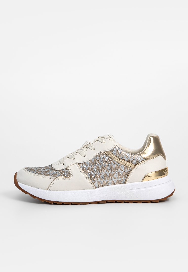 Sneakers con base in pelle bianca, dettagli glitterati dorati e suola in gomma. Presentano una forma arrotondata e un design con lacci frontali.