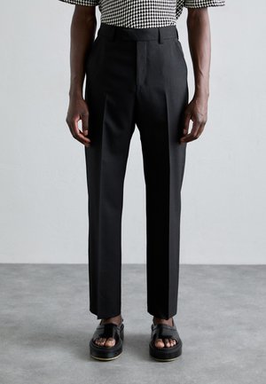 TOMMIE - Dressbukse - black