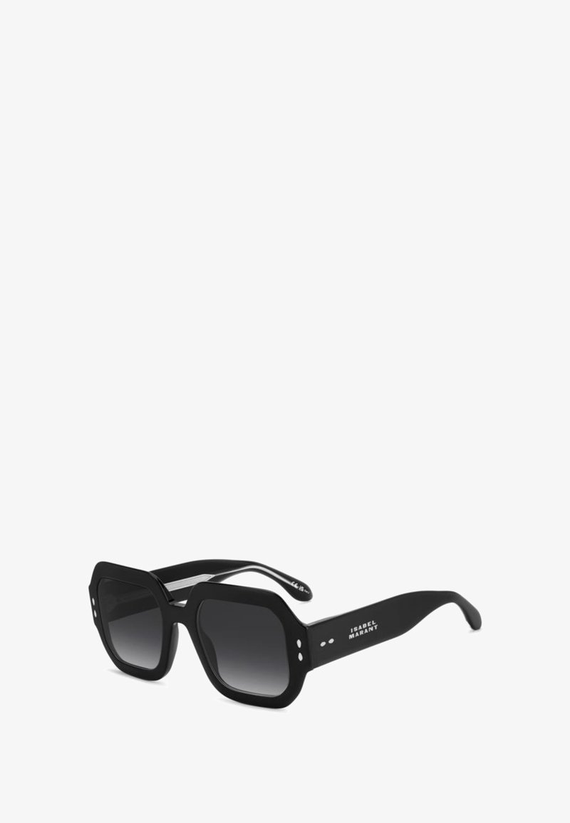 Occhiali da sole neri oversize con montatura quadrata spessa e lenti scure sfumate, con piccoli puntini argento sui lati.