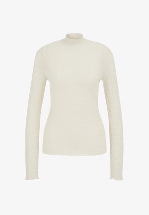 Pitkähihainen, korkeakauluksinen toppi kreemivärisenä, jossa on teksturoitu mehiläiskennon kuvio ja rispaantuneet hihansuut. Valmistettu kevyestä kankaasta.