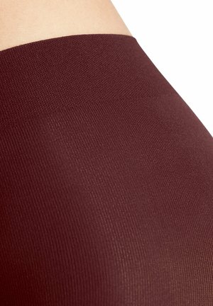 Collants bordeaux avec une texture lisse et côtelée, une large taille, un fini semi-transparent et une distribution uniforme des couleurs.