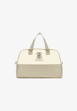 Beige ja kreem värvi duffel kott, millel on tikandembleem, sile faux nahk, kahekordsed pealmised käepidemed ja luku sulgemine.