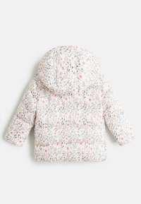 Quilted white puffer jacket with a floral pattern in pink, purple, and green. Features a hood and short sleeves. Soft texture.