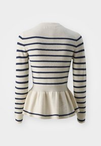 Pull rayé crème et marine, avec manches longues, corsage ajusté et ourlet à basque. Confectionné en maille texturée.