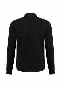 Schwarzes langärmliges Poloshirt mit strukturiertem Muster, gerippten Bündchen und Saum sowie klassischem Kragen. Glatte Stoffqualität mit taillierter Passform.