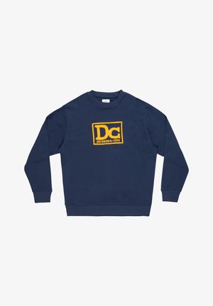 Tummansininen huppari, joka on valmistettu puuvillaseoksesta, sisältäen rohkean keltaisen graafisen logon keskellä edessä, joustavat hihansuut ja helma.