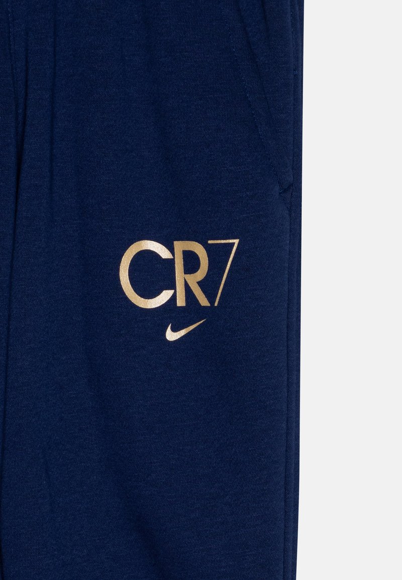 Nike Performance CR7 CLUB UNISEX Tracksuit bottoms blue void