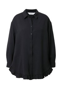 Camisa negra de botones de manga larga hecha de tela texturizada. Presenta un collar puntiagudo y un dobladillo con volantes para un detalle adicional.