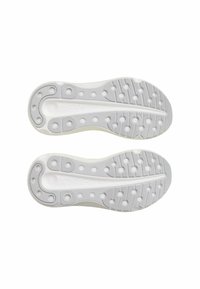 Weiße Sneaker-Sohlen mit strukturierten grauen Gummi-Unterseiten, die kreisförmige Muster und ein Logo aufweisen. Eine glatte Kantenführung und ein abgerundetes Absatzdesign.