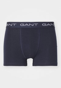 Dunkelblau Baumwoll-Boxershorts mit einem weißen Logo-Bund. Mit Flachnaht und klassischem Design.