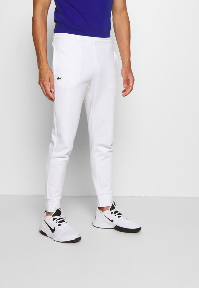 CLASSIC PANT - Verryttelyhousut - white