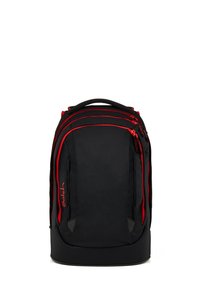 Black backpack with red zippers and trim, multiple compartments, and a top handle, standing upright on a white background.