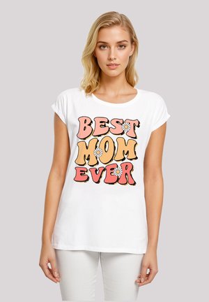White cotton t-shirt featuring bold, colorful text reading "BEST MOM EVER" in pink and orange with a floral accent on the letter "O."