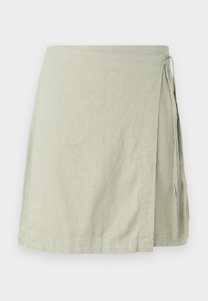 Gonna avvolgente realizzata in un tessuto leggero e strutturato di un delicato colore verde, con chiusura a nodo sul lato e orlo dritto.