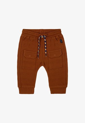 Bruine corduroy broek met twee voorzakken, ribbelmanchetten en een visgraatstructuur. Voorzien van een meerkleurige koord.