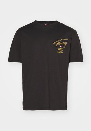 Schwarzes Baumwoll-T-Shirt mit kurzen Ärmeln, bestickt mit gelbem Text, darunter "Tommy" und Städtenamen: London, New York, Paris, Los Angeles.