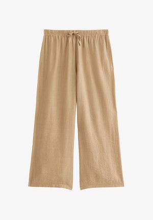 Pantaloni beige a gamba larga realizzati in tessuto testurizzato. Presentano una vita elastica con cordino. Superficie liscia con cuciture minime.