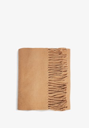 Brūns austu segu ar mīkstu tekstūru, ar frīzu detaļu gar vienu malu. Taisnstūrveida forma, gluda virsma, nav redzamu rakstu.