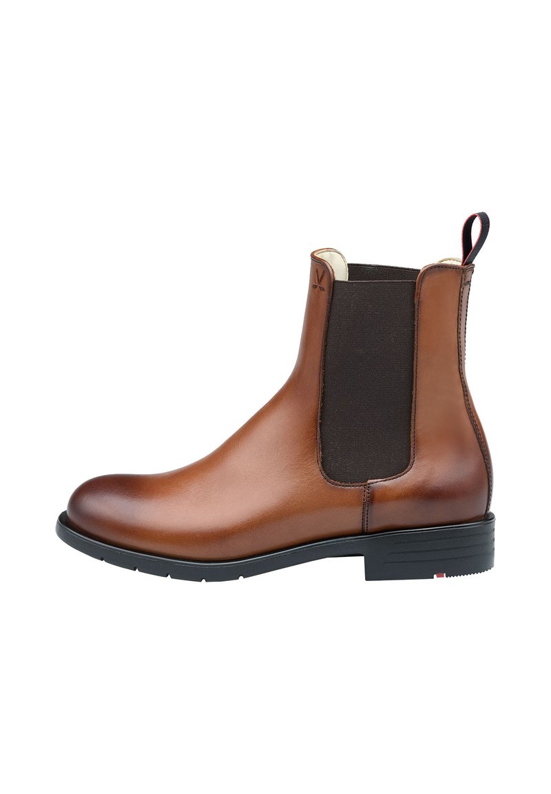 Stivaletto Chelsea in pelle marrone con pannelli laterali elasticizzati e una linguetta. Presenta una finitura liscia, punta arrotondata e una suola in gomma nera.