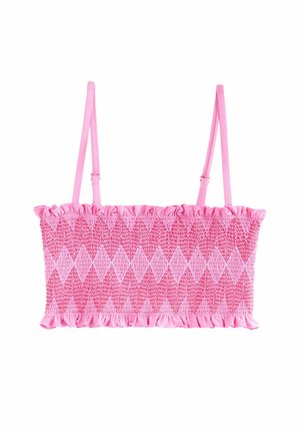 Pink smocked crop top with thin straps, featuring a diamond pattern and ruffled edges, made from a stretchy fabric for a fitted look.