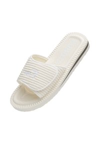 White slip-on sandal with textured, ribbed strap, perforated footbed, and rubber sole. Features a subtle logo accent.