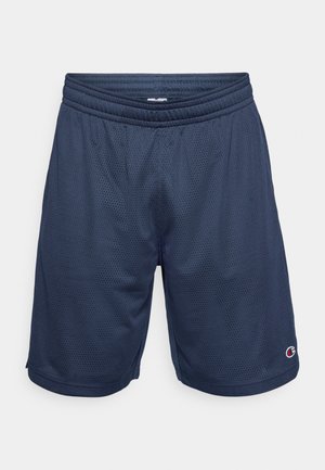 Shorts de sport en maille bleu marine avec taille élastique, présentant un petit logo sur la jambe inférieure droite et un tissu texturé respirant.