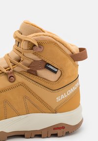 Salomon OUTCHILL beżowy