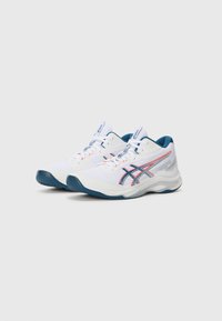 White athletic shoes with mesh material, blue accents, and red striped detailing. Rounded toe and textured sole for traction. Lace-up design.