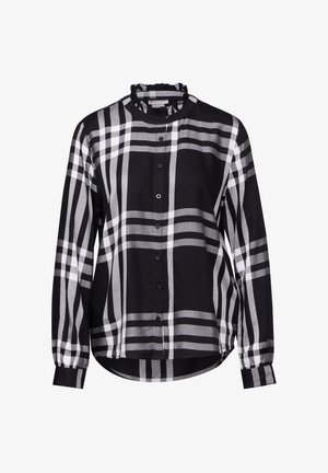 Camisa a cuadros en blanco y negro con cuello rizado, mangas largas, cierre de botones y dobladillo curvado. Material de algodón con una textura suave.