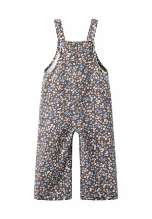 Salopetă fără mâneci pentru copii, cu picioare largi, din material maro acoperit cu un model floral mic albastru, alb și bej.