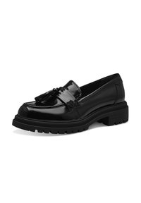 Mocasines de charol negro con detalle de borlas, punta redonda y suela de goma negra gruesa con profundos surcos para una mejor tracción.