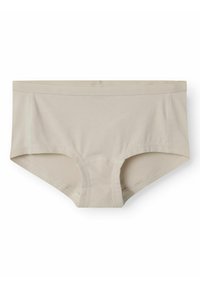 Pantaloni boyshorts in cotone beige con un morbido elastico in vita, caratterizzati da una texture liscia e cuciture minimali per il massimo comfort.