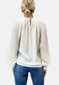 Elara Top - weiß