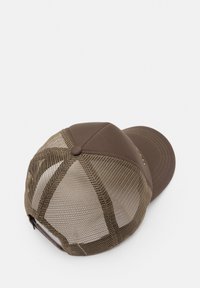 Brown baseball cap with a solid fabric front and mesh back. Features a rounded crown, curved brim, and a gold accent detail.