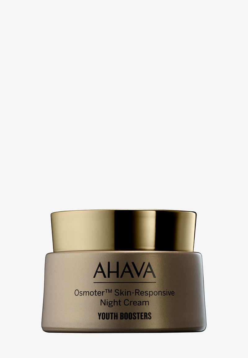 Osmoter™ Hudresponsiv Natcreme i en rund, guldfarvet krukke med beige krop. Etiketten har sort tekst og produktnavn.