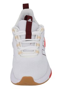 White athletic shoe with mesh upper, maroon accents, beige strap details, and gum rubber sole. Features white laces and branded logo.